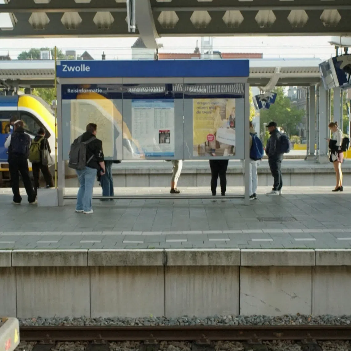 People gather on a train platform after suspected sabotage disrupted Dutch train services, in Zwolle, Netherlands, in this screengrab taken from a video released on September 15, 2026. Video obtained by Reuters/Handout via REUTERS