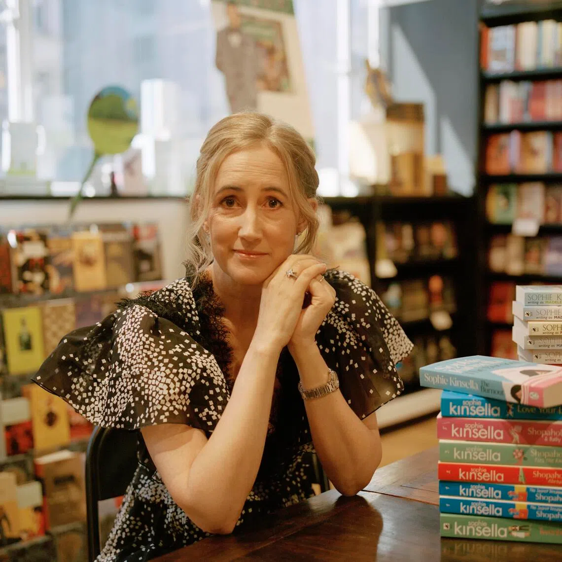 FILE — The author Sophie Kinsella at an event at a Waterstones bookstore in London, June 30, 2024. Madeleine Wickham, the British author whose “Confessions of a Shopaholic” novels under the pen name Sophie Kinsella were an international sensation, died on Wednesday, Dec. 10, 2025. She was 55. (Sandra Mickiewicz/The New York Times)