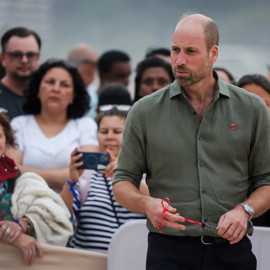 Britain's Prince William looks on as he meets with lifeguards and their students at Copacabana Beach, during an official visit in Rio de Janeiro, Brazil, November 3, 2025. REUTERS/Ricardo Moraes