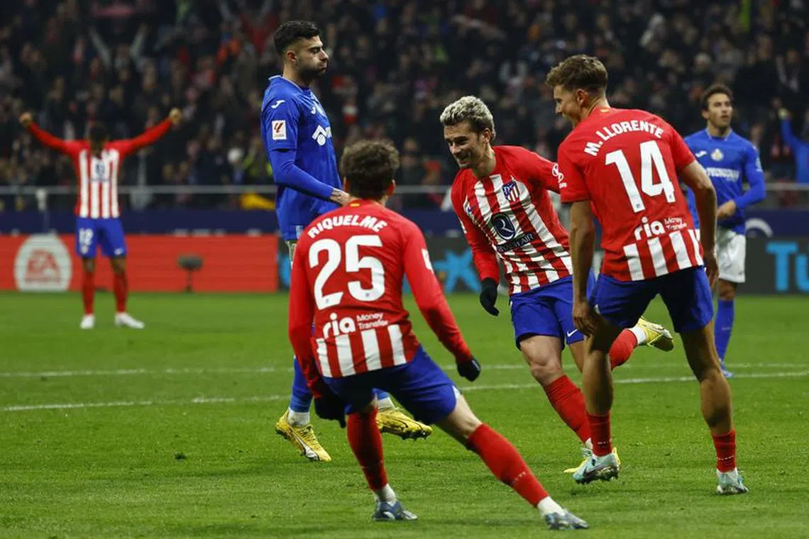 Soccer Football - LaLiga - Atletico Madrid v Getafe - Metropolitano, Madrid, Spain - December 19, 2023 Atletico Madrid's Antoine Griezmann celebrates scoring their third goal with teammates REUTERS/Susana Vera/File photo