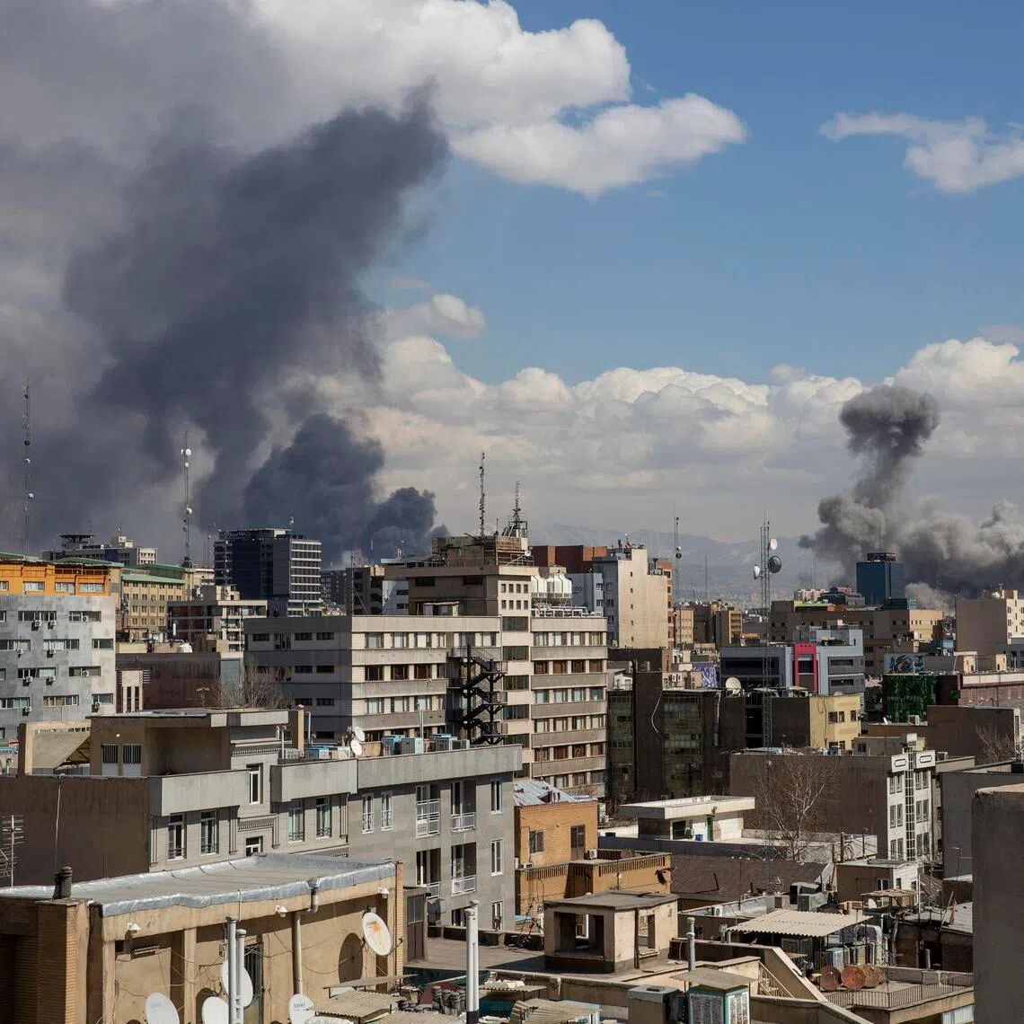Smoke rising after coordinated US and Israeli air strikes in Tehran on  March 1, 2026. 