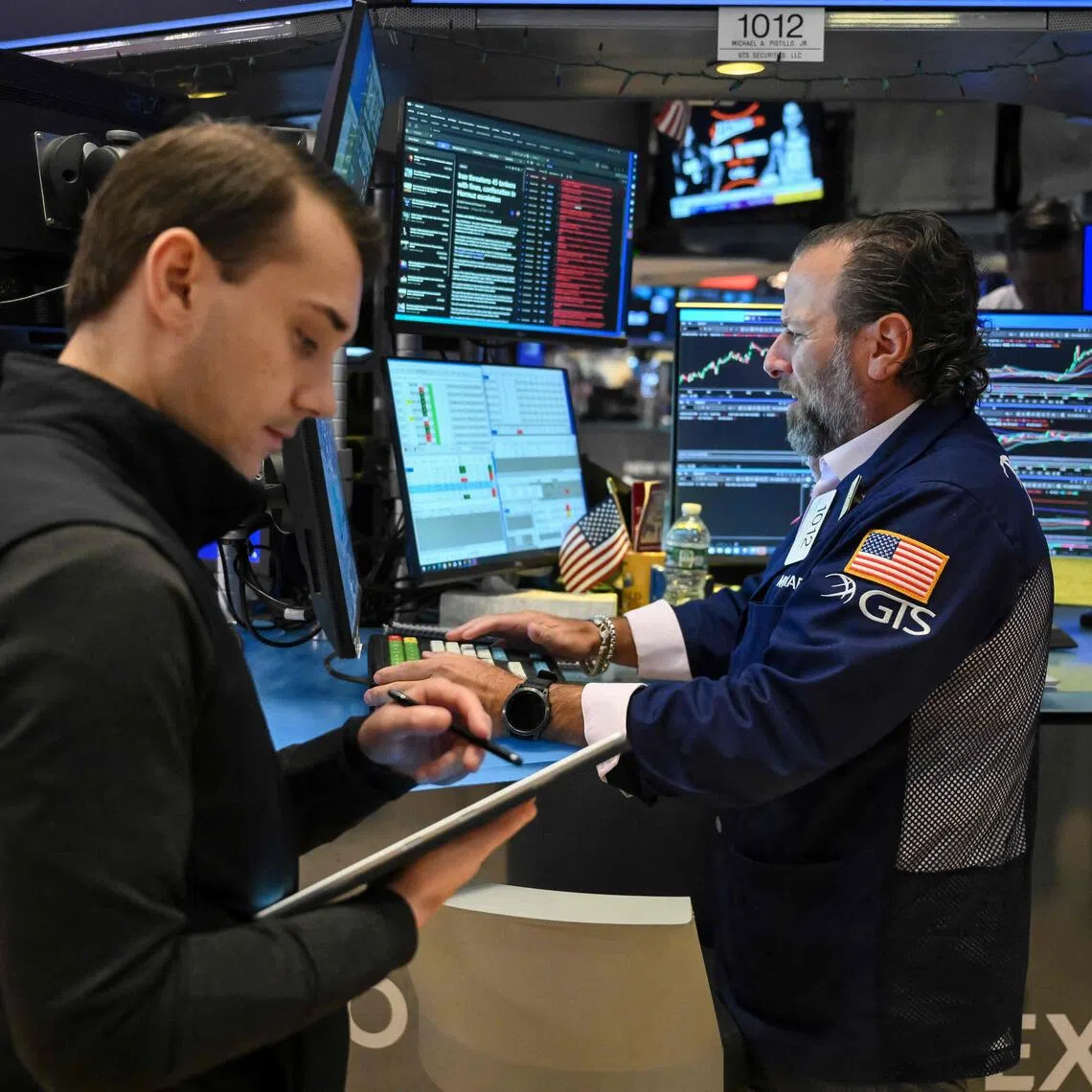 Traders working on the floor of the New York Stock Exchange, on Oct 19 in New York City.