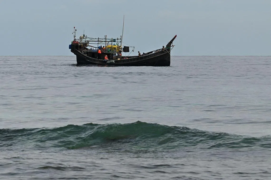 The two overcrowded boats carrying about 400 passengers had experienced engine failures, and were now drifting in the Andaman Sea.