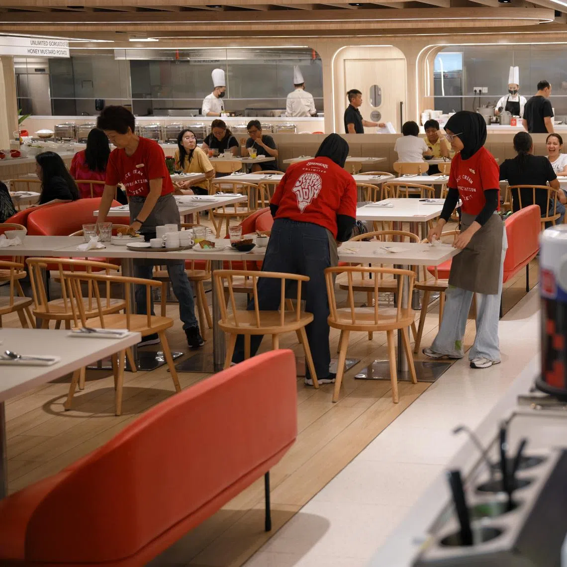 About 15,000 full-time food services workers will have their monthly salaries raised to at least $2,220, said the Ministry of Manpower.