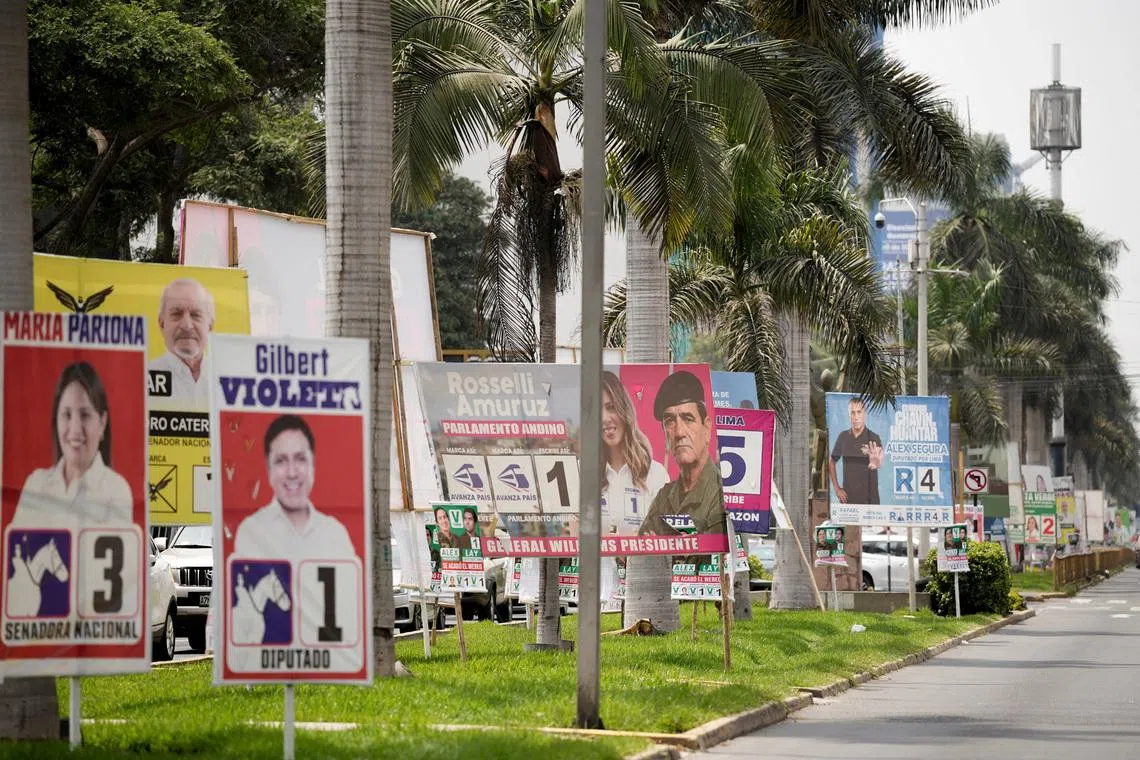 FILE PHOTO: Political advertising is on display ahead of the April 12 general election, in Lima, Peru, April 8, 2026. REUTERS/Angela Ponce/File Photo