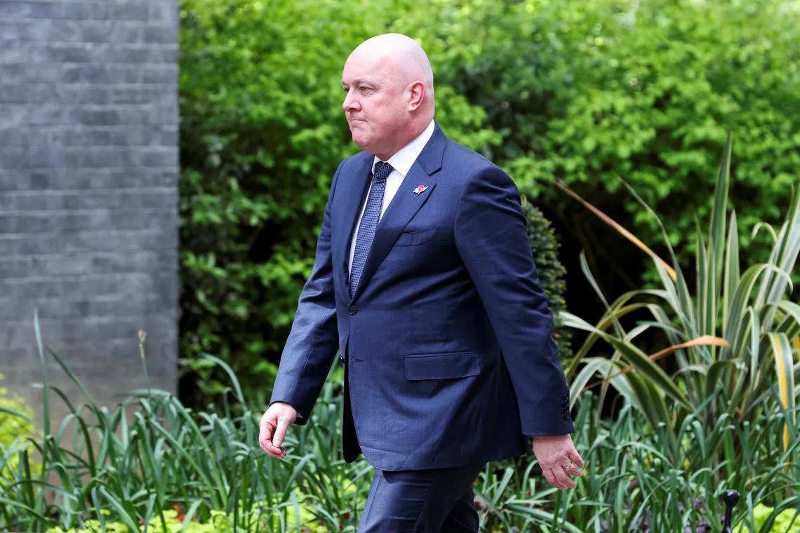 FILE PHOTO: New Zealand's Prime Minister Christopher Luxon walks at Downing Street to meet Britain's Prime Minister Keir Starmer, in London, Britain, April 22, 2025. REUTERS/Belinda Jiao/File Photo