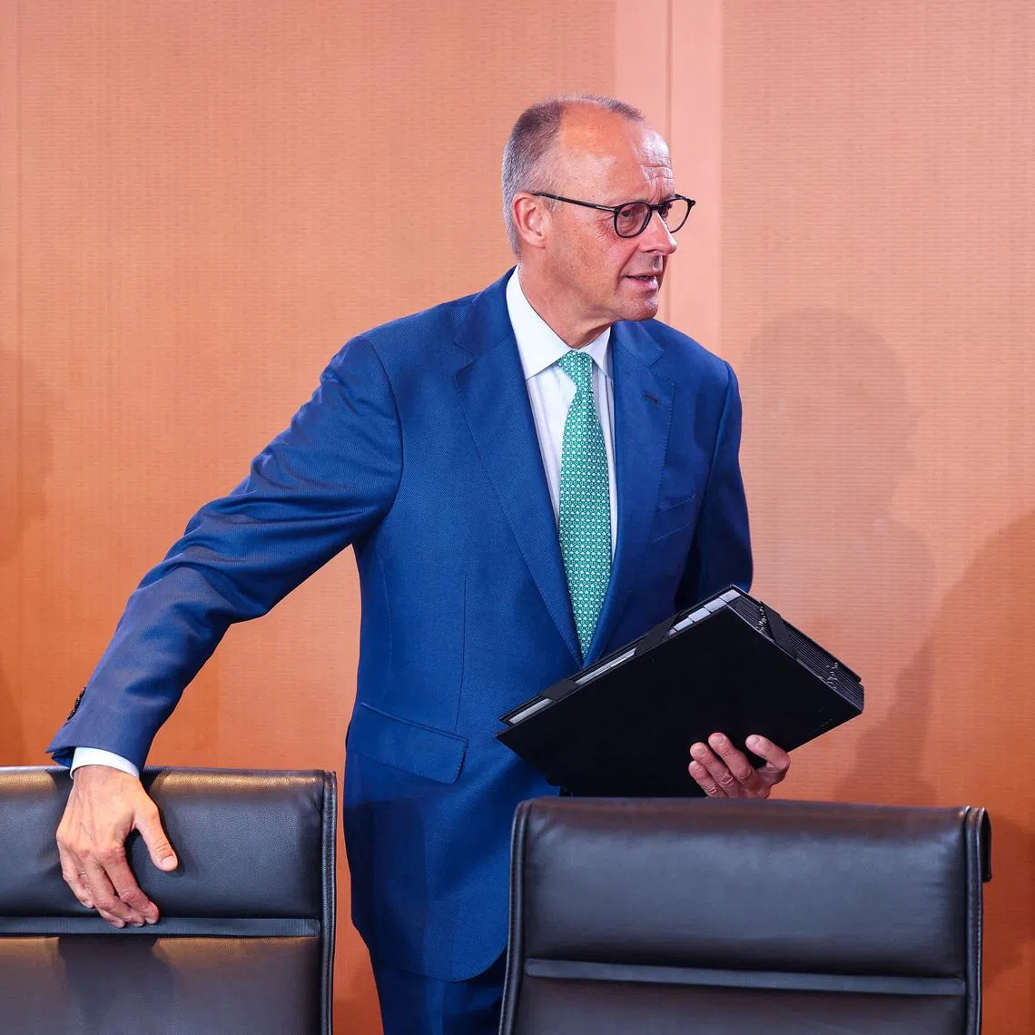 German Chancellor Friedrich Merz arrives for a cabinet meeting at the Chancellery in Berlin, Germany, July 22, 2026. REUTERS/Christian Mang
