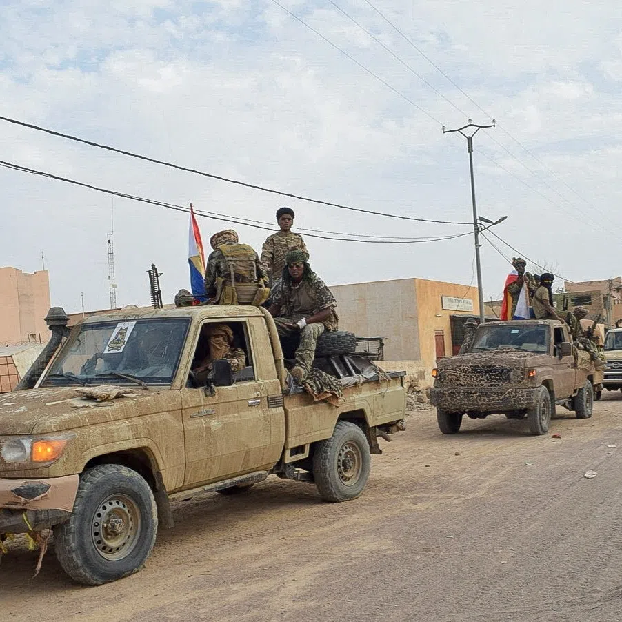 PICTURE TAKEN ON APRIL 27, 2026: Members of the Azawad Liberation Front (FLA) take part in a parade, two days after the group said it had retaken the city of Kidal, Mali, April 27, 2026. Picture taken with a mobile phone. REUTERS/Stringer