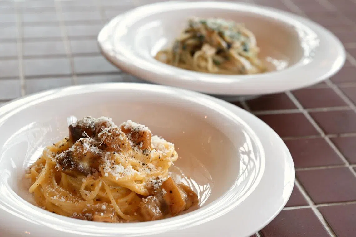 Two of Luciano Monosilio’s pasta dishes are on the menu at Casa Vostra at Tampines Mall: Luciano’s Spaghetti Alla Carbonara (foreground) and Luciano’s Spaghetti Ai Cardoncelli.