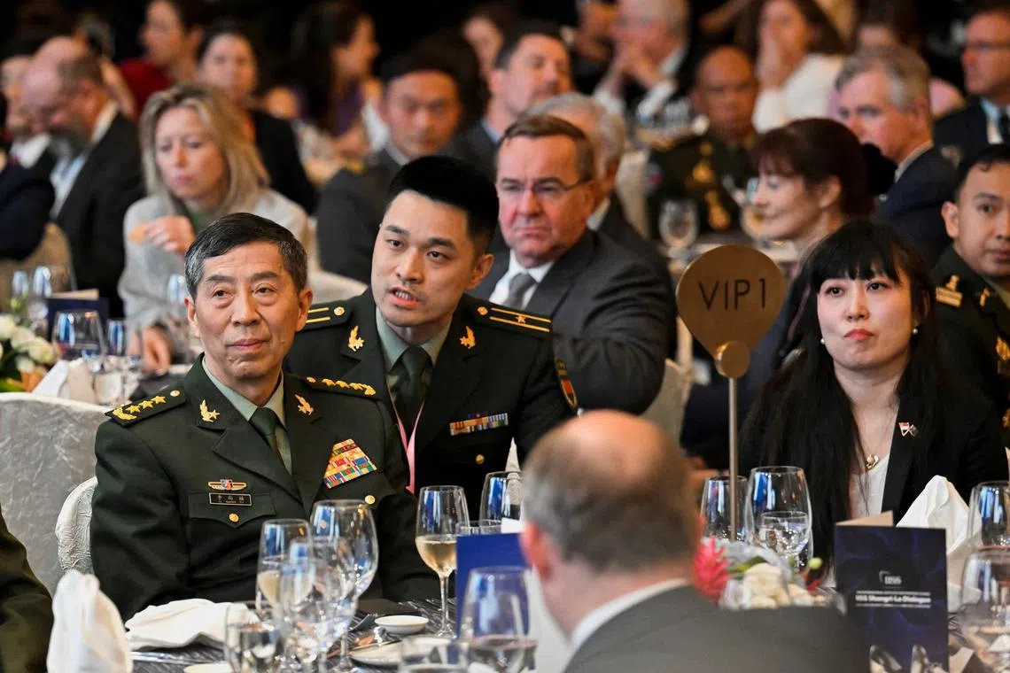 Chinese Defence Minister Li Shangfu (foreground, left) at the Shangri-La Dialogue on June 2.