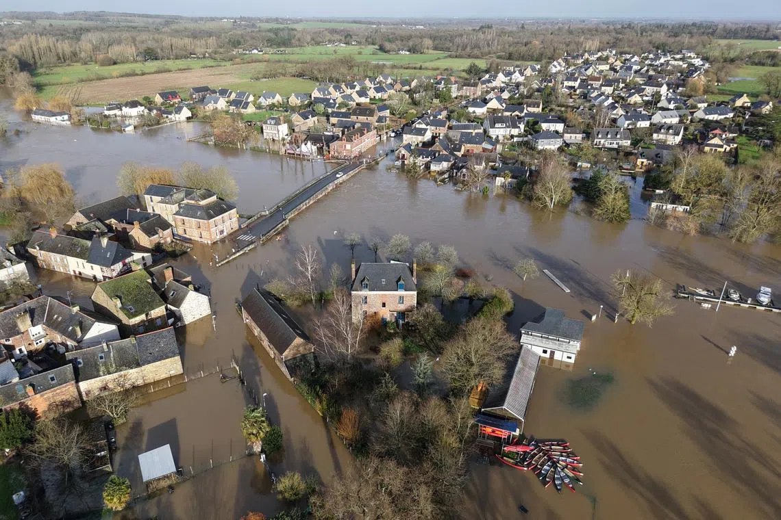 A drone view shows a flooded area at Le Pont Rean in Guichen near Rennes as the Vilaine river overflows after days of heavy rain causing flooding as the storm Herminia hits western France, January 27, 2025. REUTERS/Stephane Mahe