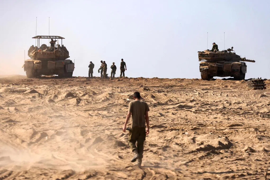 Israeli forces on the border with Gaza in southern Israel on Nov 5.