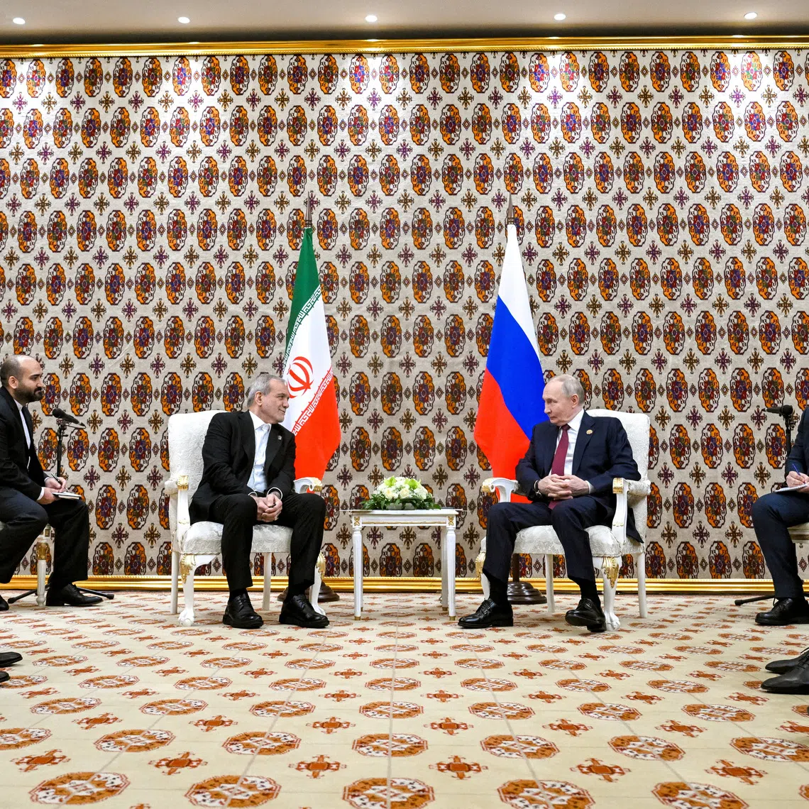 Russian President Vladimir Putin and Iranian President Masoud Pezeshkian attend a meeting in Ashgabat, Turkmenistan December 12, 2025. Sputnik/Kristina Kormilitsyna/Pool via REUTERS
