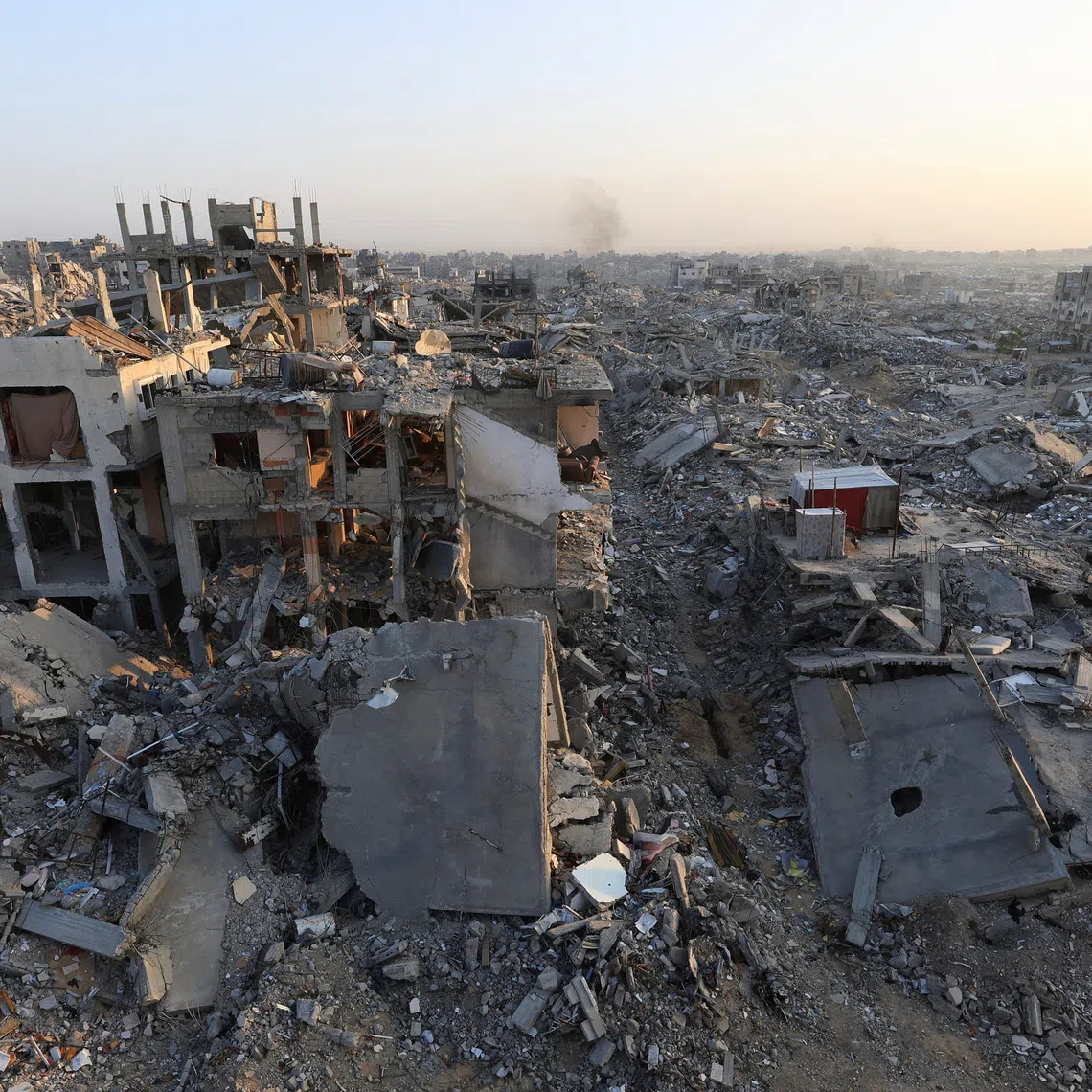 Piles of rubble and damaged buildings in Gaza City, November 24, 2025. REUTERS/Dawoud Abu Alkas