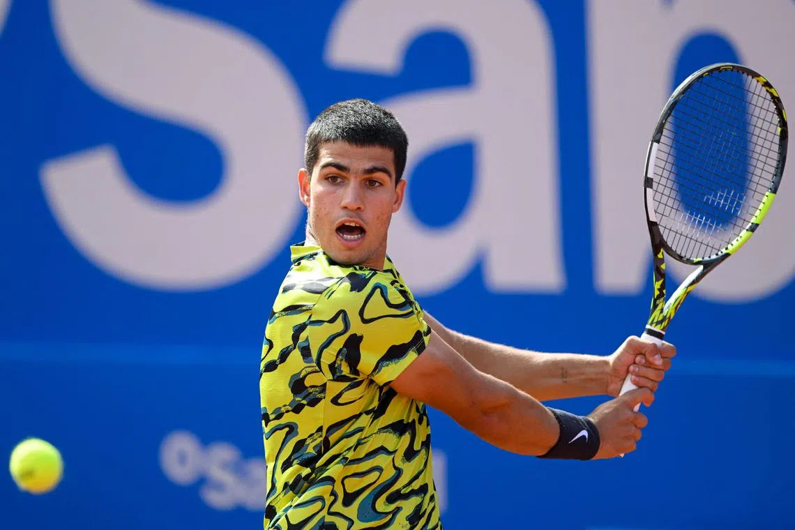 Spain's Carlos Alcaraz returns the ball to Spain's Alejandro Davidovich during the ATP Barcelona Open.