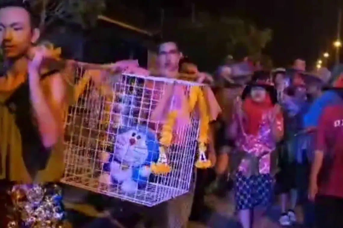 The ritual which took place late in April, traditionally involving a cat, was conducted using a Doraemon doll.