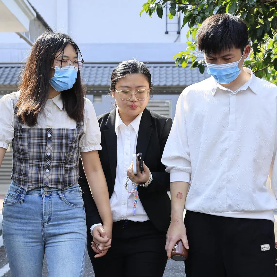 Xu Jianfeng (right) and Shi Qian (left) pleaded guilty to the charge.