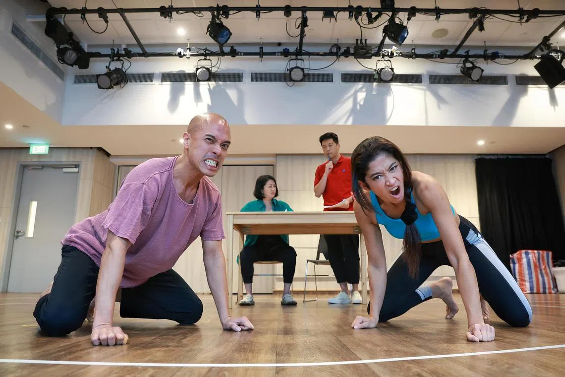 Cast members of G*d Is A Woman (L-R) Brendon Fernandez, Zee Wong, Benjamin Chow and Munah Bagharib rehearsing a scene in the studio at Wild Rice on Aug 10, 2023.
