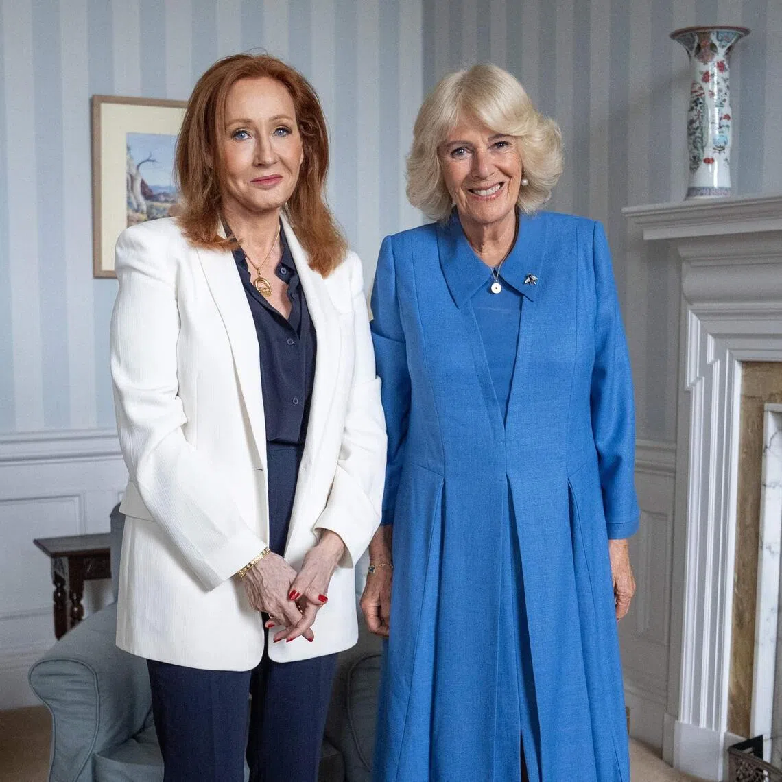 Harry Potter author J.K. Rowling (left), seen here with Britain’s Queen Camilla, has spoken in the past of being a survivor of domestic violence.