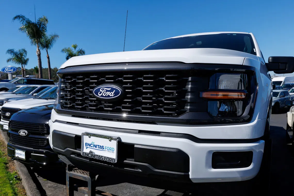 Ford F-150 pickup trucks for sale in Encinitas, California, U.S. October 20, 2025. REUTERS/Mike Blake