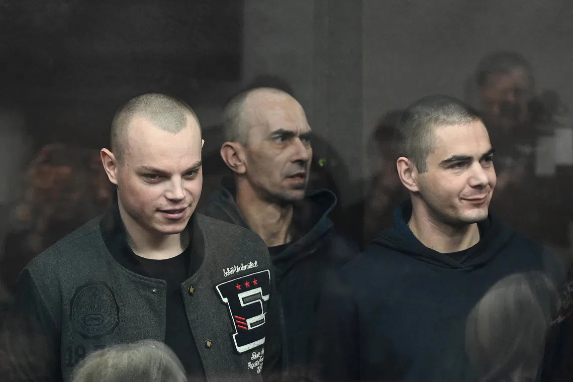Russia hands long prison sentences to 15 captured Ukrainian fighters