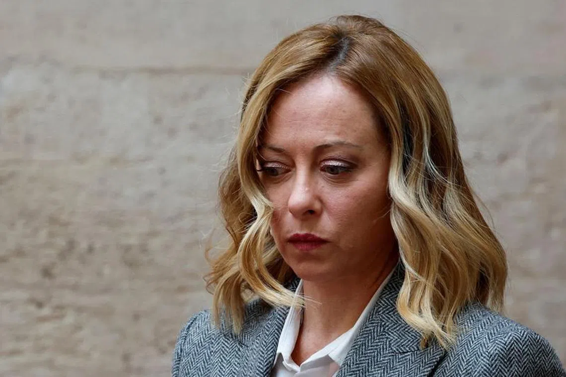 FILE PHOTO: Italian Prime Minister Giorgia Meloni looks on as she waits for Slovenian Prime Minister Robert Golob at Palazzo Chigi, in Rome, Italy, November 14, 2023. REUTERS/Remo Casilli/File Photo