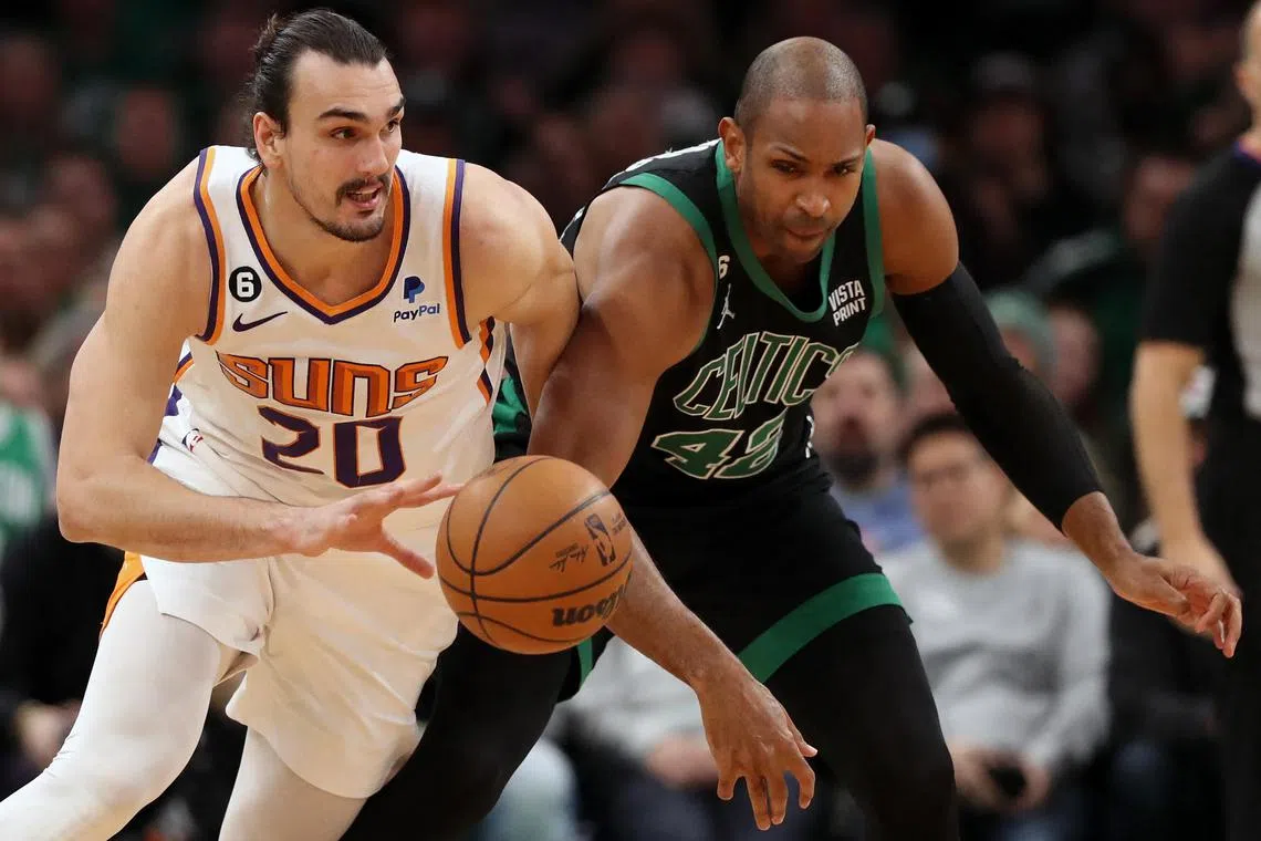 Dario Saric (L) was one of two players to claim double-doubles for the Suns.