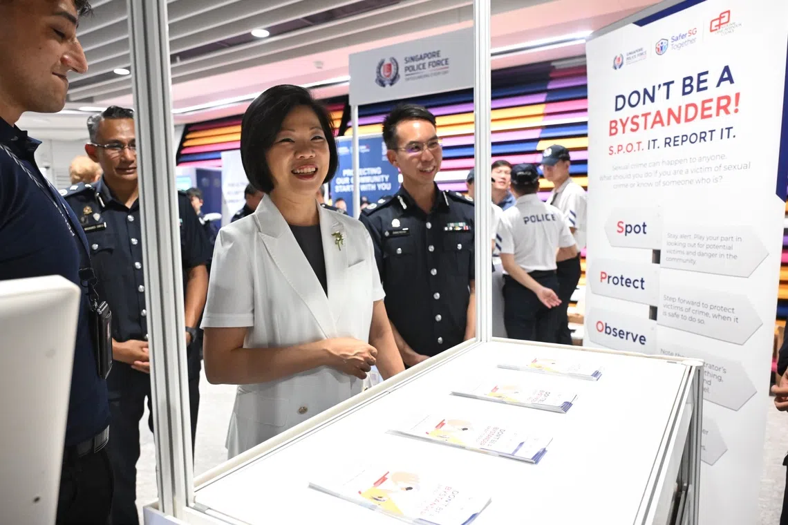 Sim Ann, Second Minister for Home Affairs and Foreign Affairs, touring the Public Transport Security Command Community Roadshow on Sept 4.