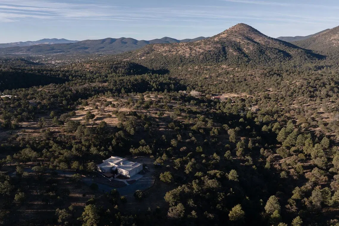 HEADLINE: Insurers Drop Homeowners Over Climate Risks
CAPTION: The home of Richard D. Zimmel on the outskirts of Silver City, N.M., on Tuesday, Dec. 10, 2024. Without insurance, it’s impossible to get a mortgage; without a mortgage, most Americans can’t buy a home. 
CREDIT: (Paul Ratje/The New York Times)