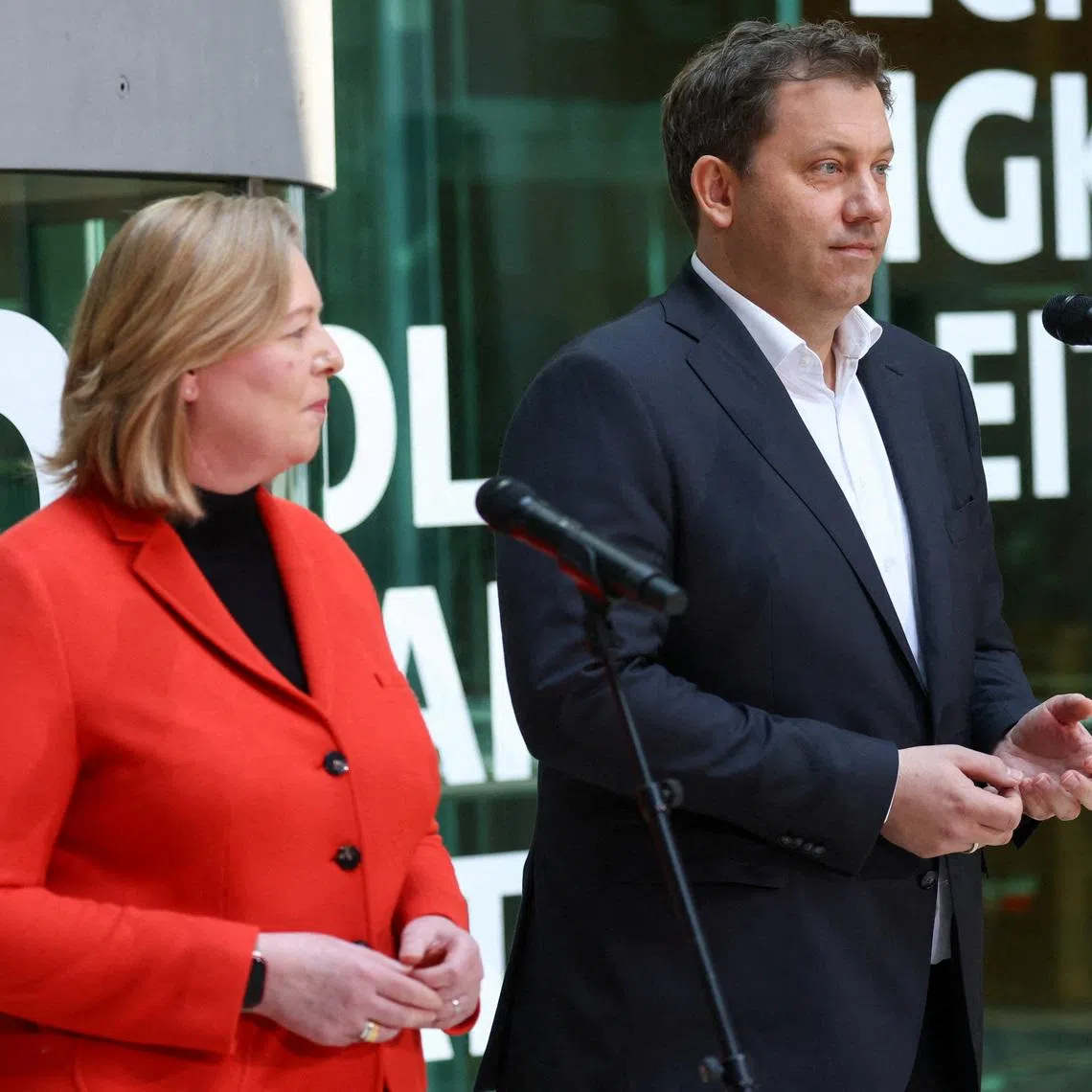 FILE PHOTO: Lars Klingbeil and Baerbel Bas, co-leaders of Germany's Social Democratic Party (SPD), hold a press conference following the Rhineland-Palatinate state election, at the SPD headquarters in Berlin, Germany, March 23, 2026. REUTERS/Christian Mang/File Photo