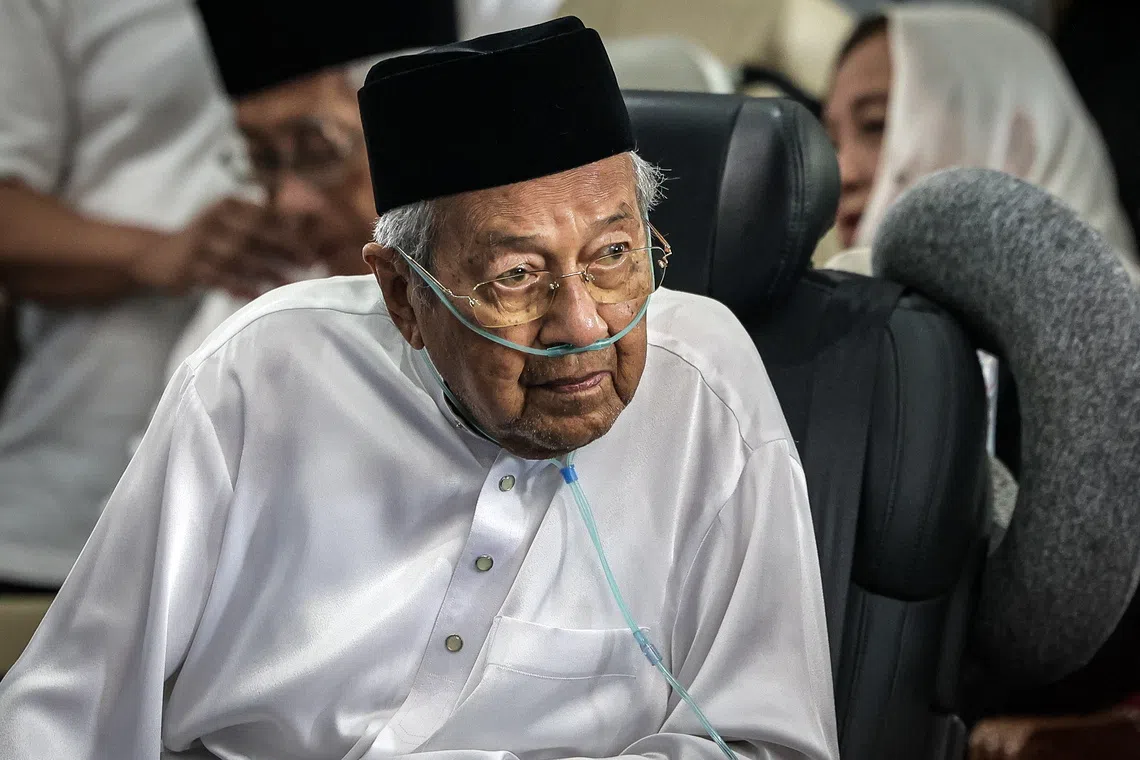 Malaysia’s former PM Mahathir in hospital after wife’s death