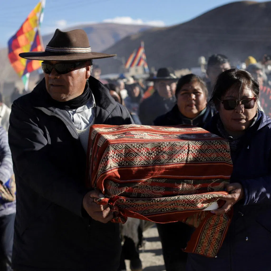 People participate in a ceremony following the return of the so-called “Child of Chani,” an Inca-era child mummy found frozen in 1905 at nearly 5,900 meters on a mountain, after being returned to a local indigenous community following about 120 years in a Buenos Aires museum, El Moreno, in Jujuy province, Argentina May 28, 2026. REUTERS/Gianni Bulacio
