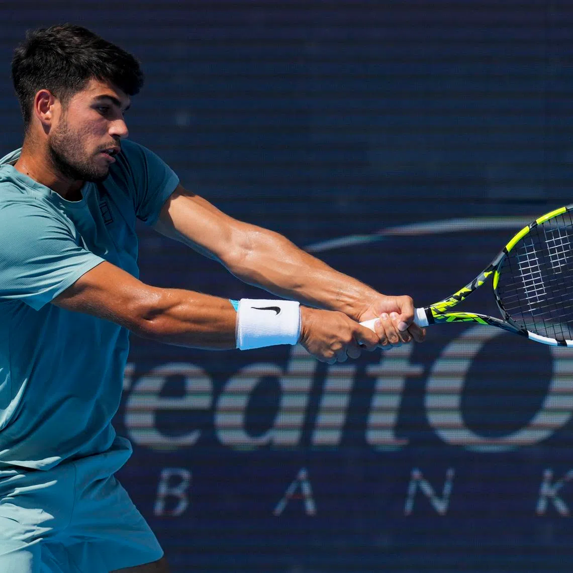 Aug 18, 2025; Cincinnati, OH, USA;  Carlos Alcaraz (ESP) returns a shot against Jannik Sinner (ITA) during the Cincinnati Open at the Lindner Family Tennis Center. Mandatory Credit: Aaron Doster-Imagn Images/File Photo