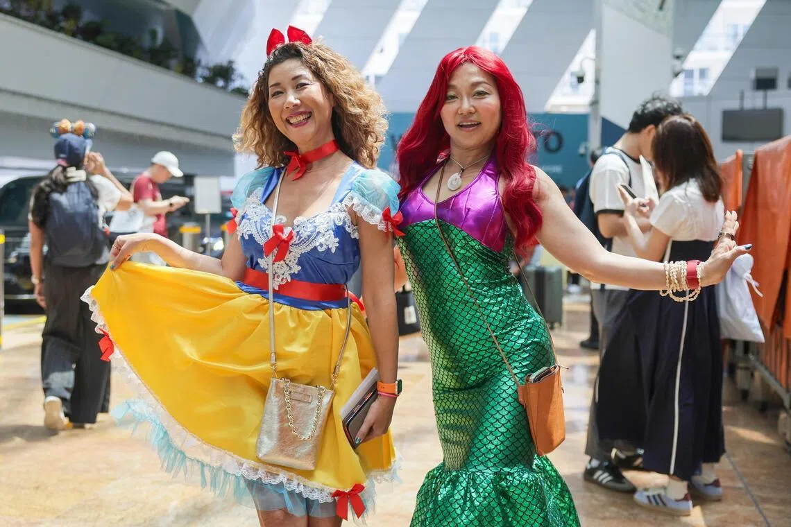 Passengers dressed up as Disney characters at the Marina Bay Cruise Centre Singapore for Disney Adventure’s maiden voyage.