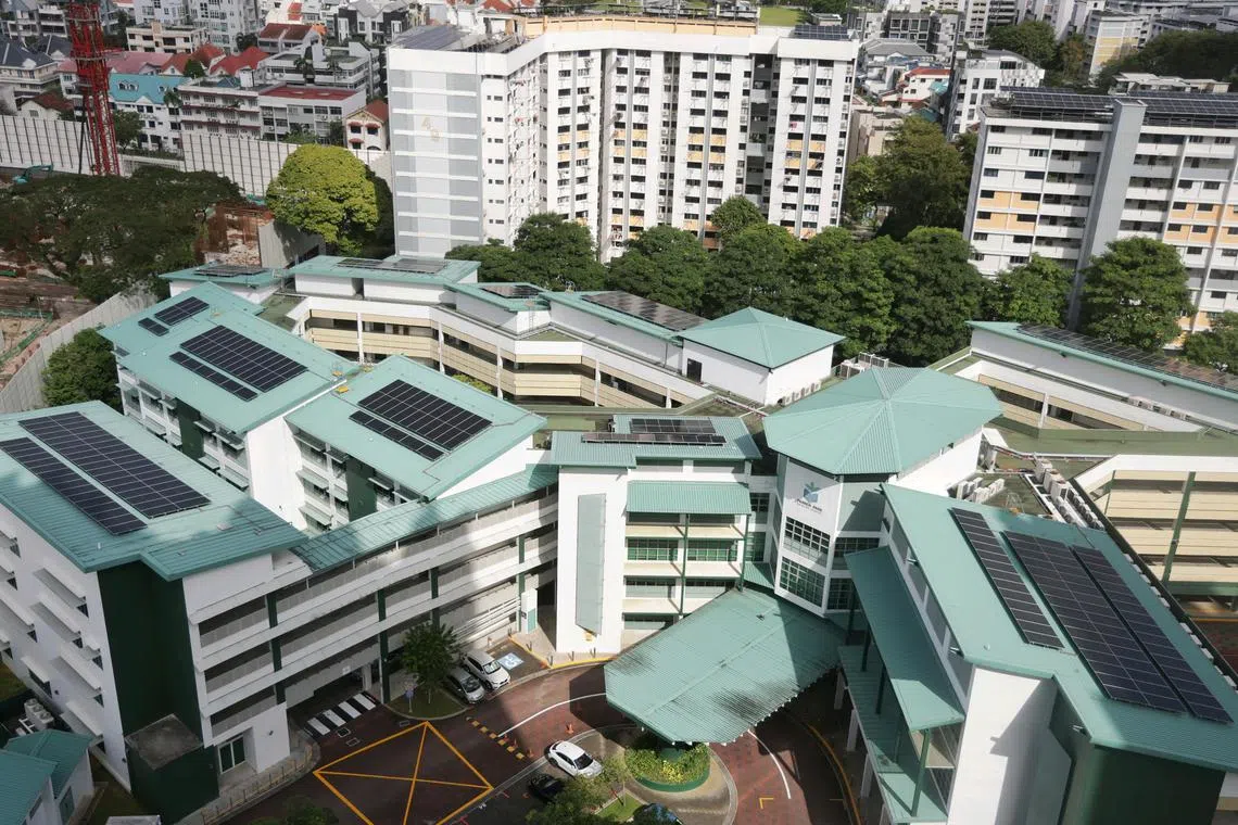 Solar panels on the roofs of Farrer Park Primary School. Singapore is laying the groundwork for importing clean energy from its neighbours, while deploying solar panels in unusual places.