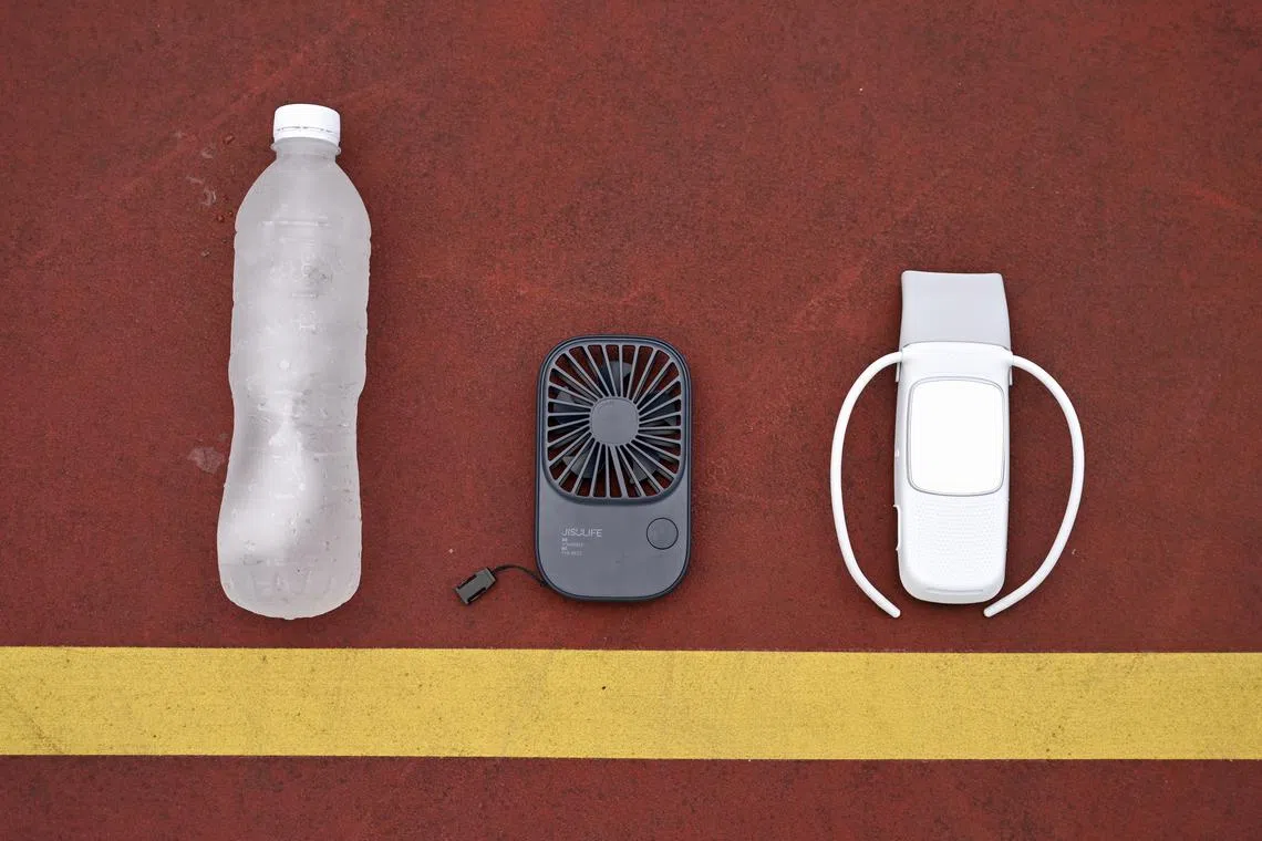 ST puts bottles of ice-cold water, a portable fan and the Sony Reon Pocket to the test by taking each item out for 1km walk in the afternoon sun.