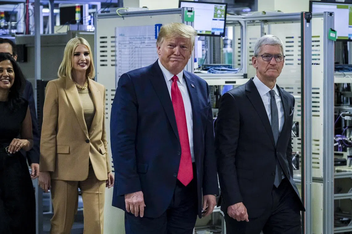 Trump (left) praised Mr Cook (right), saying he’s done an “incredible job” leading Apple and said the iPhone maker has a “bright future.” 