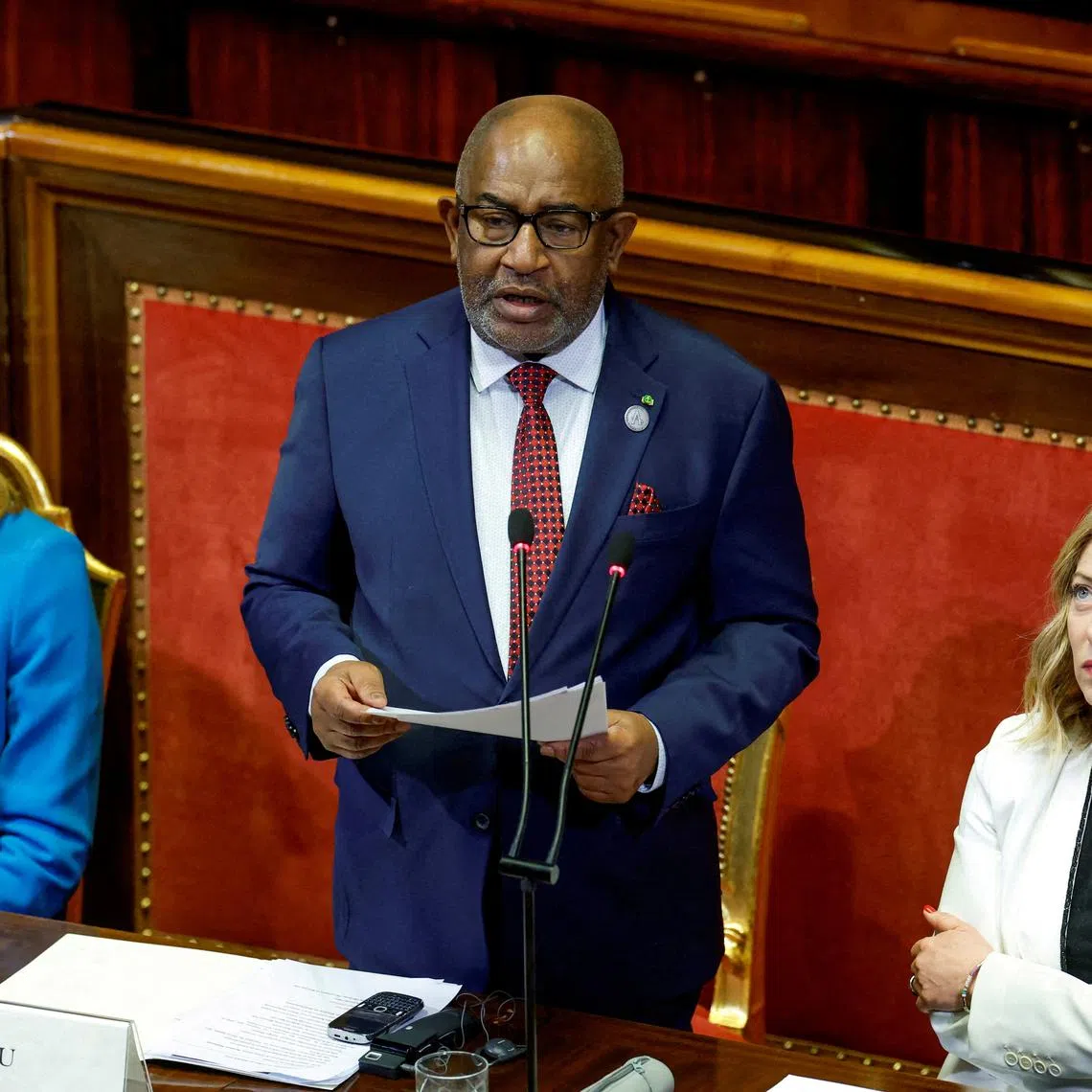 FILE PHOTO Comoros President Azali Assoumani speaks next to Italy's Prime Minister Giorgia Meloni and President of the European Parliament Roberta Metsola at  an Italy-Africa summit in Rome, Italy January 29, 2024. REUTERS/Remo Casilli/File Photo