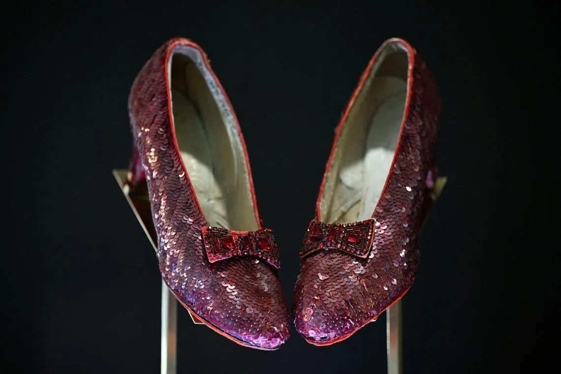 The ruby slippers worn by US actress and singer Judy Garland in the 1939 film The Wizard Of Oz are pictured on display in London on Nov 27.