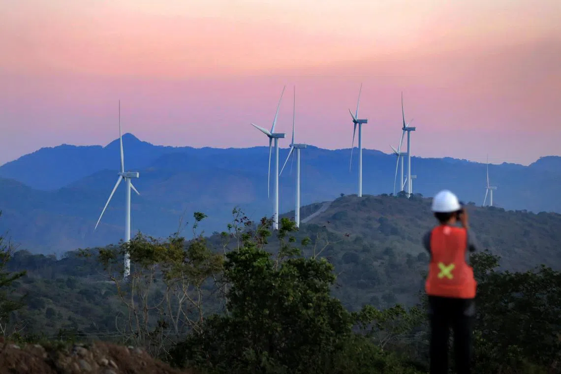 Wind turbines at the Sidrap wind farm in Sidenreng Rappang regency, South Sulawesi, Indonesia.