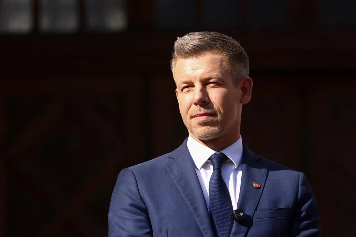 Hungarian Prime Minister Peter Magyar looks on at a meeting with Polish Prime Minister Donald Tusk during his first official visit to the country, in Gdansk, Poland, May 20, 2026. REUTERS/Lukasz Glowala