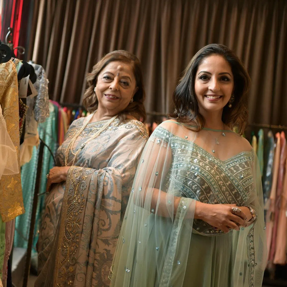 A 2021 photo of Indian fashion boutique Stylemart’s managing director and fashion designer, Kavita Thulasidas (right), with her mother, Huri Baxani.