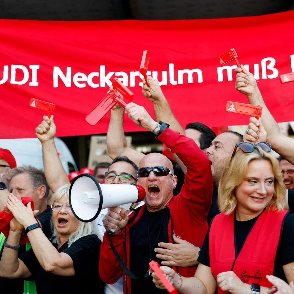 Workers gather to protest at Audi's car plant, one of the facilities threatened with possible closure as part of restructuring plans by parent company Volkswagen in Neckarsulm, Germany, July 29, 2026.