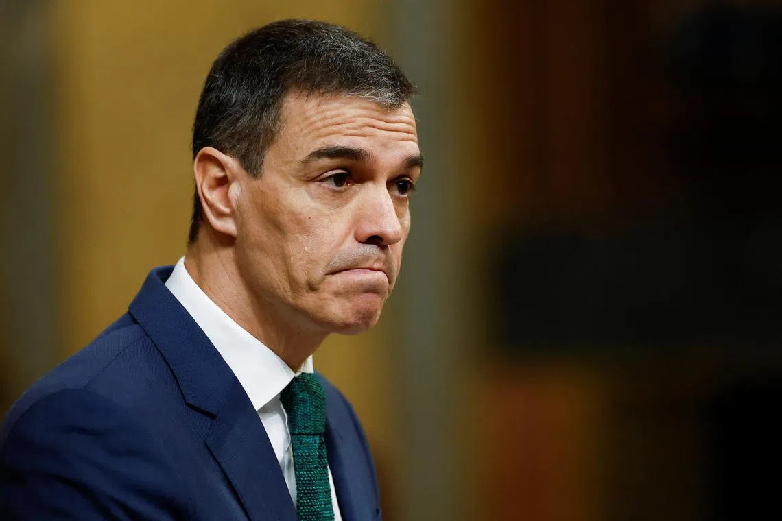 Spanish Prime Minister Pedro Sanchez reacts as he addresses Parliament on new geopolitical scenario, at Parliament in Madrid, Spain, March 26, 2025. REUTERS/Juan Medina