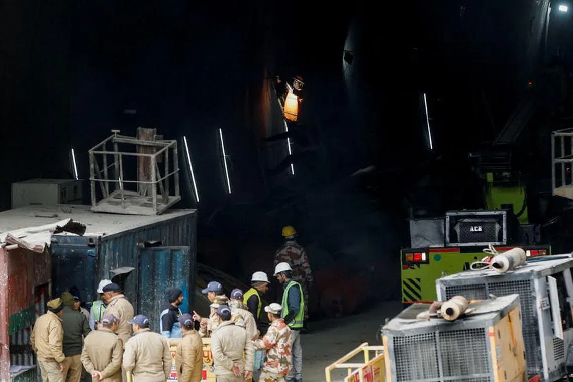 A member of the rescue team works as rescue operations continue at a tunnel where workers are trapped, after the tunnel collapsed, in Uttarkashi in the northern state of Uttarakhand, India, November 28, 2023. REUTERS/Francis Mascarenhas