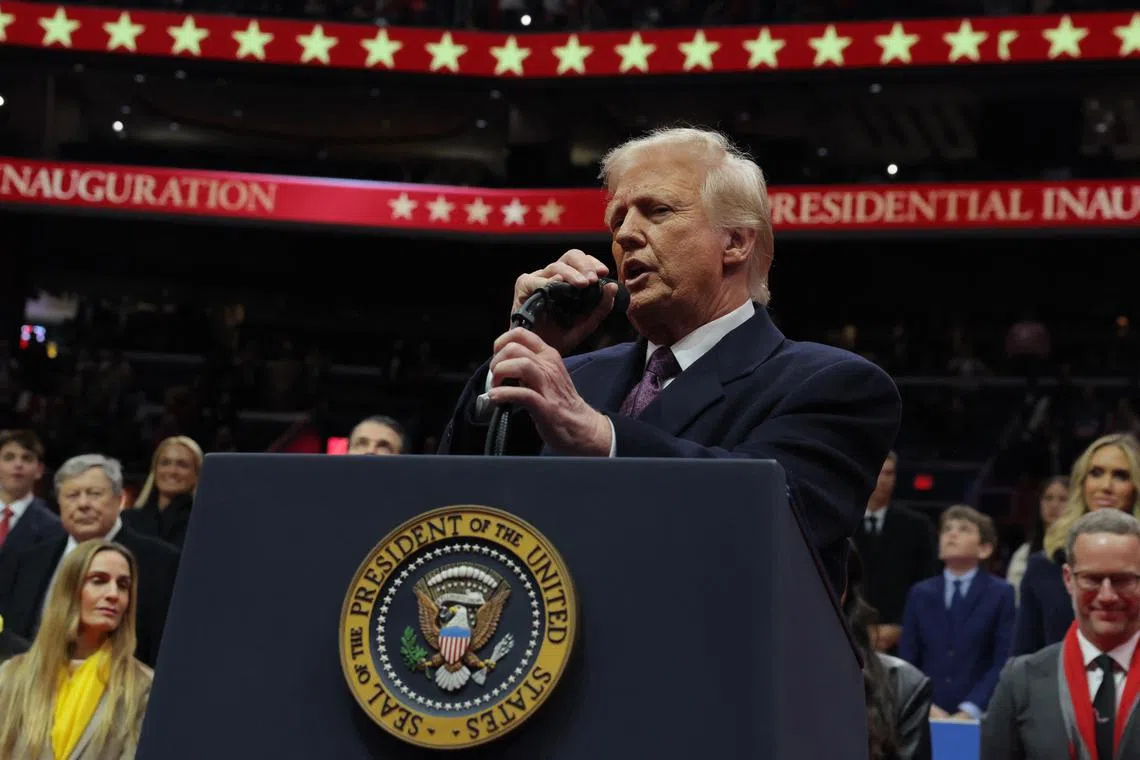 U.S. President Donald Trump speaks during the inaugural parade inside Capital One Arena on the inauguration day of his second presidential term, in Washington, U.S. January 20, 2025. REUTERS/Carlos Barria