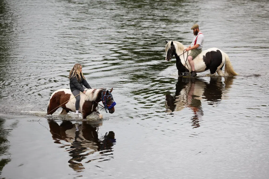 Riders in the River Eden during the Appleby Horse Fair in Appleby-in-Westmorland, Britain, on June 5, 2025. 
