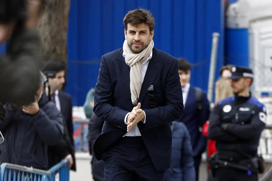 FILE PHOTO: Soccer Football - Former player Gerard Pique testifies in court over sale of Spanish Super Cup rights - Majadahonda, Spain - March 14, 2025 Former Spain footballer Gerard Pique is seen outside the court REUTERS/Juan Medina/File Photo