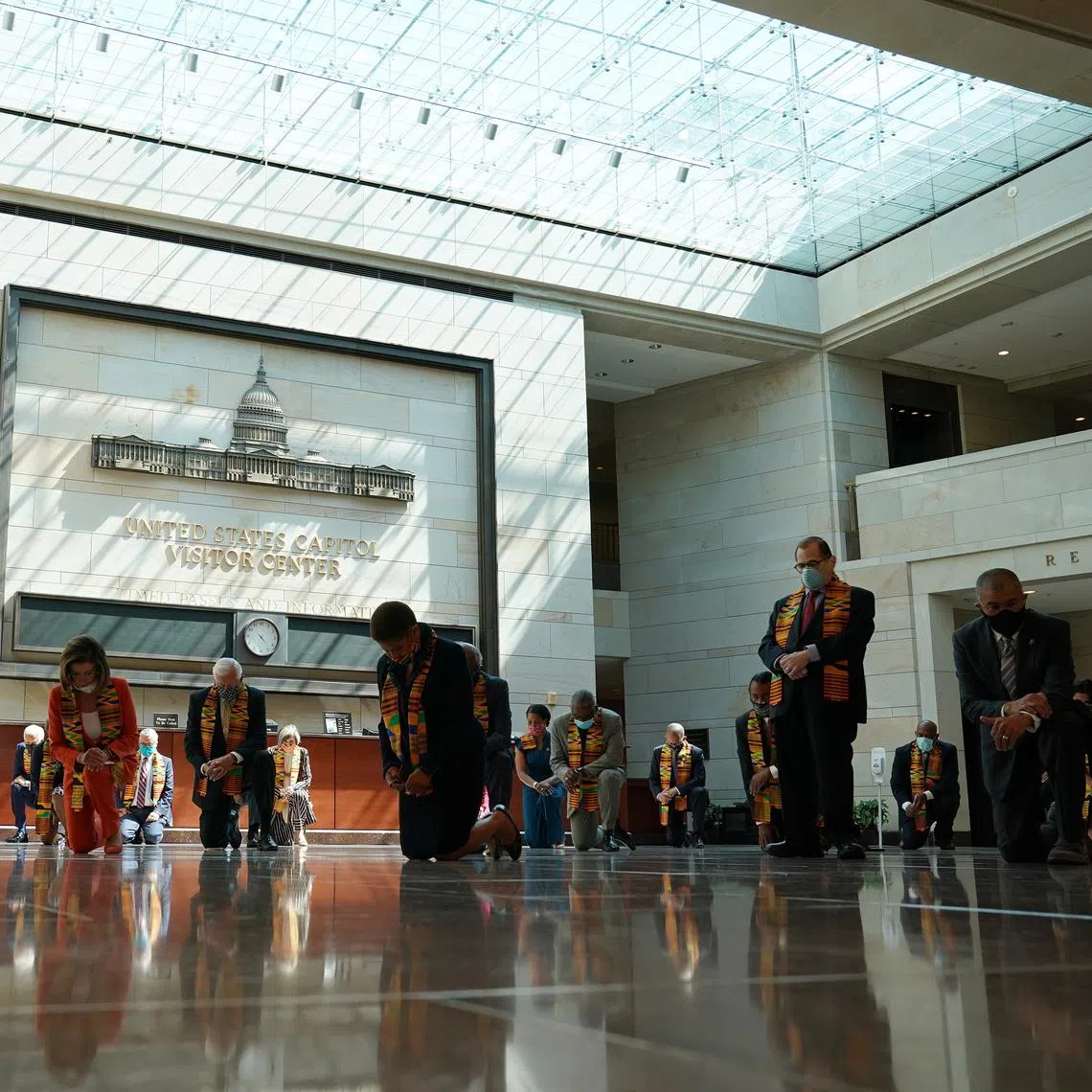 US senators and Congress members observing a moment of silence at the US Capitol in Washington on June 8, 2020, to honour Mr George Floyd and other victims of police brutality.