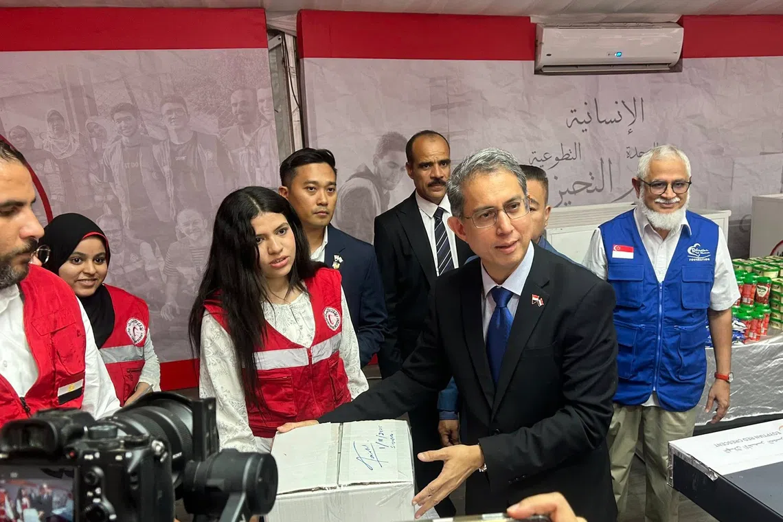 Acting Minister-in-charge of Muslim Affairs Faishal Ibrahim and the Rahmatan Lil Alamin Foundation team visiting the Egyptian Red Crescent in Cairo on Nov 1.